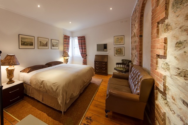 Presbytery room with heritage stone wall